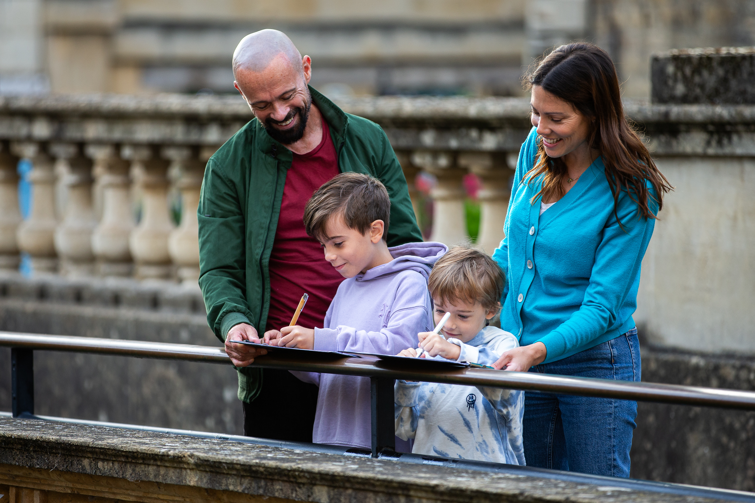 A family of four enjoying the Medusa mystery trail