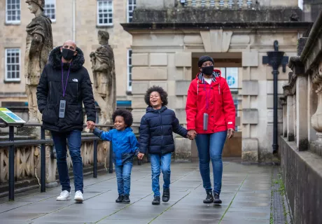 Image: Family visiting the Roman Baths