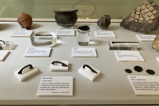 Display of objects in a glass case